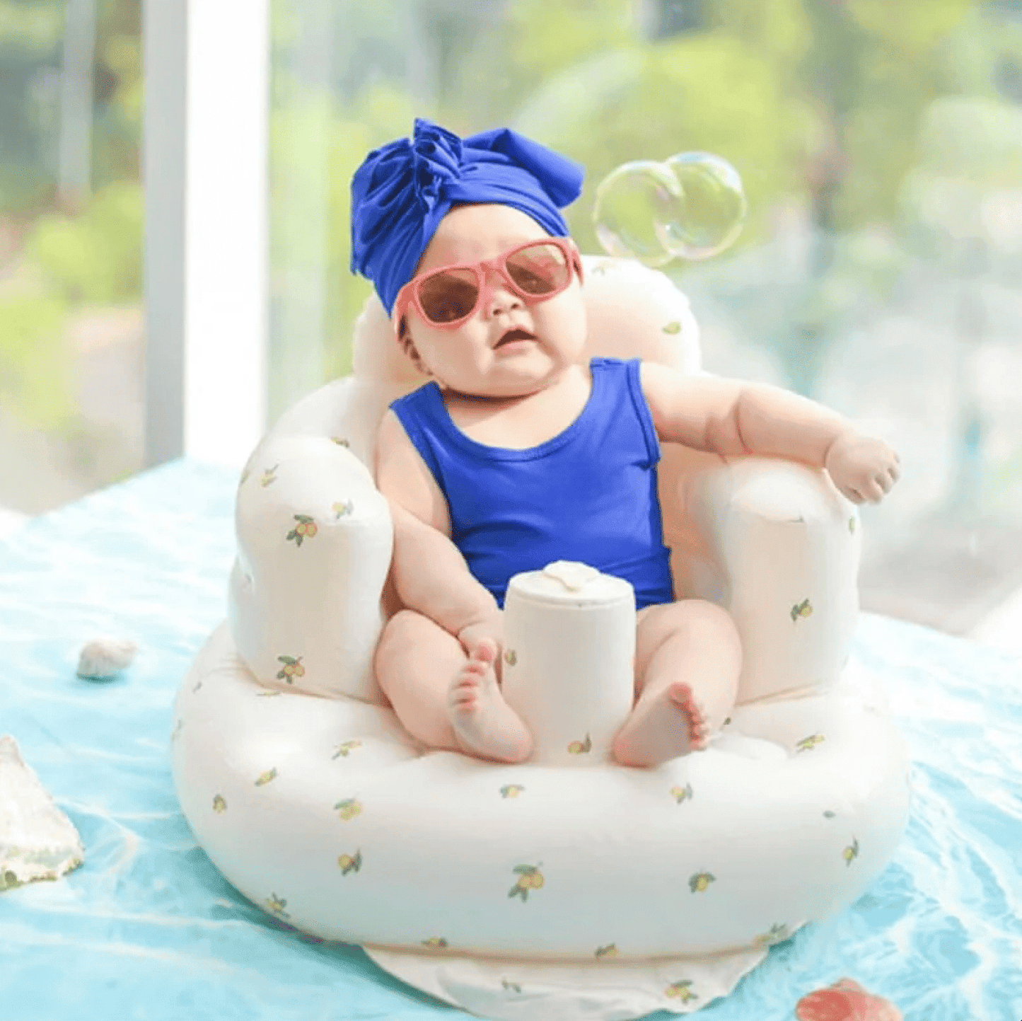 Side view of inflatable chair with anti-slip base and supportive armrests