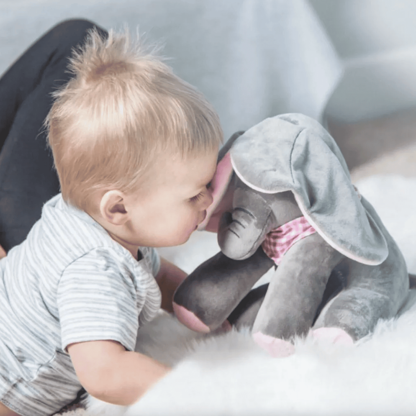 Cute plush elephant singing and covering eyes – engaging baby toyBuzz