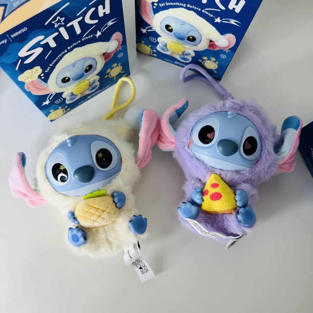 Soft Labubu Stitch plush keychain holding snack – front view