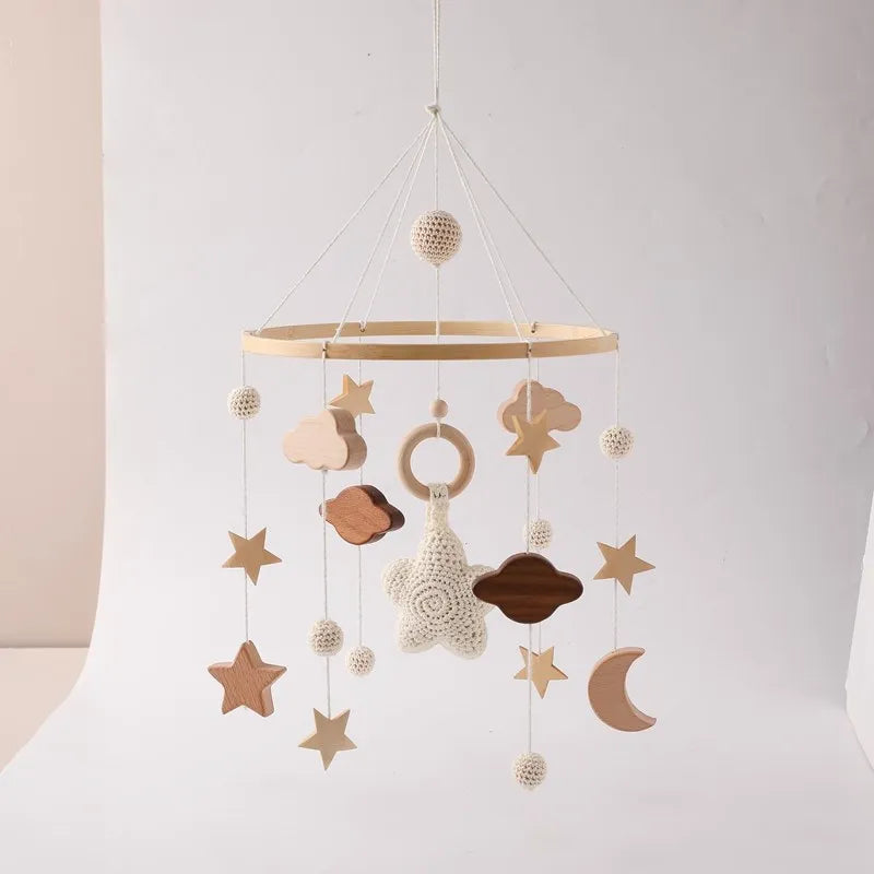 Wooden frame baby mobile with crochet design