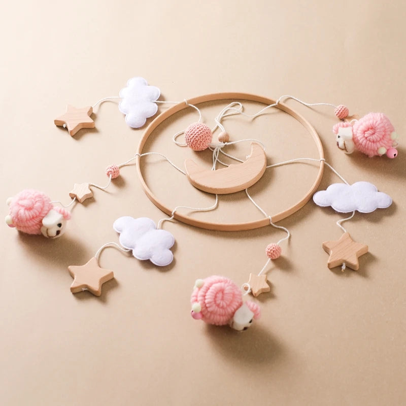 Nursery mobile with moon and sheep