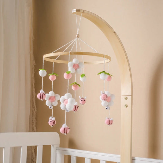 Handmade baby mobile with bees and daisies