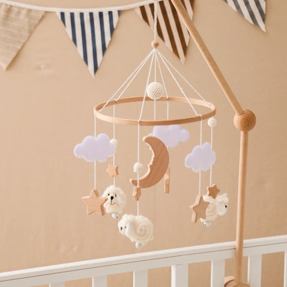 Wooden crib mobile with soft toys