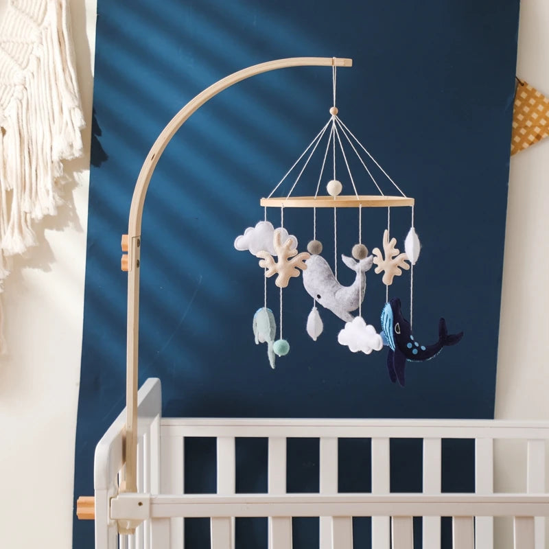 Baby mobile with whale, clouds, and stars – natural wood frame
